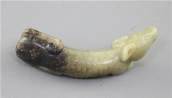 A Chinese yellow and black jade carving of a dog, Song dynasty or later, length 6cm